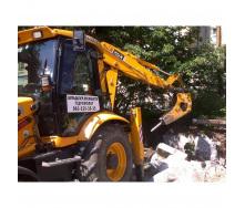 Ломка здания гидромолотом CAT H65